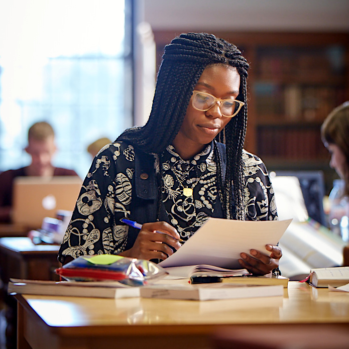 A student working in Selwyn's library