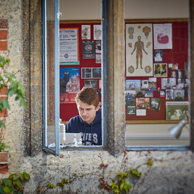 A student working in his room