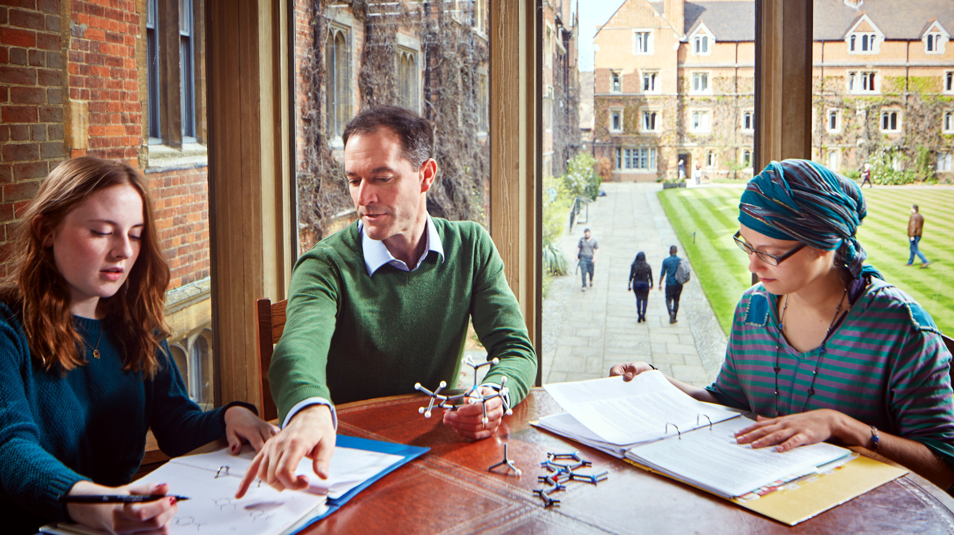 A Natural Sciences supervision in the Harrison Room, led by Dr Daniel Beauregard.