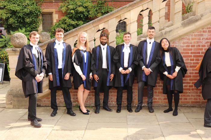 Graduate Students Outside Hall Steps