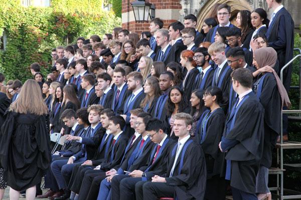 Matriculation Photo students seated outside chapel
